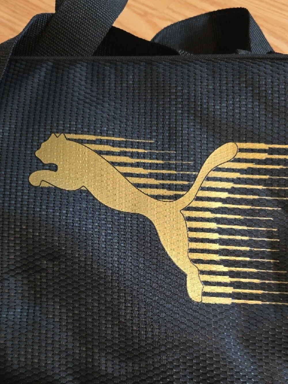 Puma Black Duffel with Gold Puma Logo